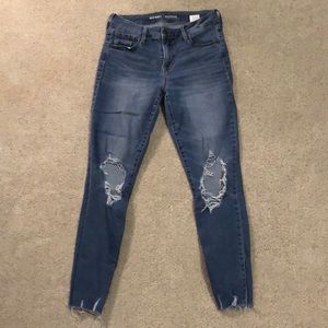 Rockstar Mid Rise Distressed Skinny Jeans